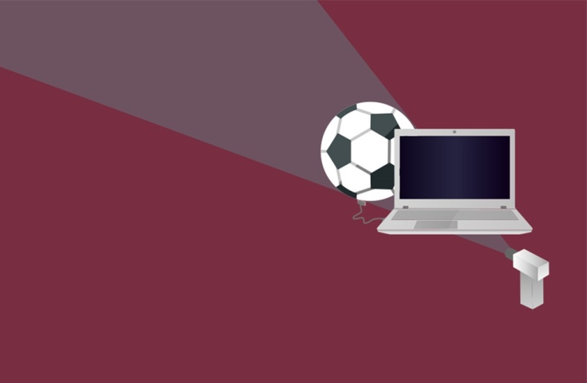 Laptop and football icons on dark red background